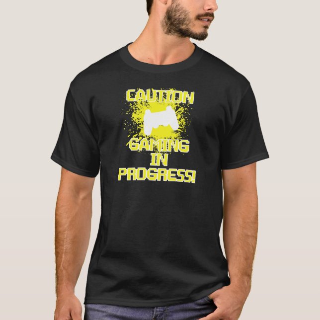 Camiseta Precaución, juego en curso (Anverso)
