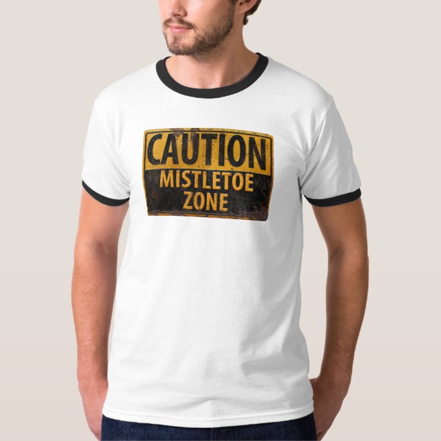 Camiseta Precaución Navidades de la zona de Mistletoe besan (Anverso)