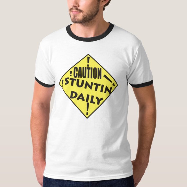 Camiseta Precaución STUNTIN diaria (STUNTIN DIARIO POR (Anverso)