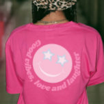 Camiseta Preppy sigue siendo asombroso lema sonar cara rosa<br><div class="desc">La confianza de un niño al estilo de un adormidera es una camisa de refuerzo. Las lecturas siguen siendo sorprendentes con una cara sonriente con ojos estrellados y rayas arcoiris en rosa pastel y azul acuático con una cara sonriente en el diseño de la camiseta inversa. Personaliza con tu propia...</div>