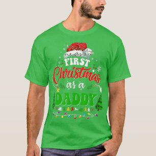Camiseta Primera Navidad como papi Santa Hat navidades feas