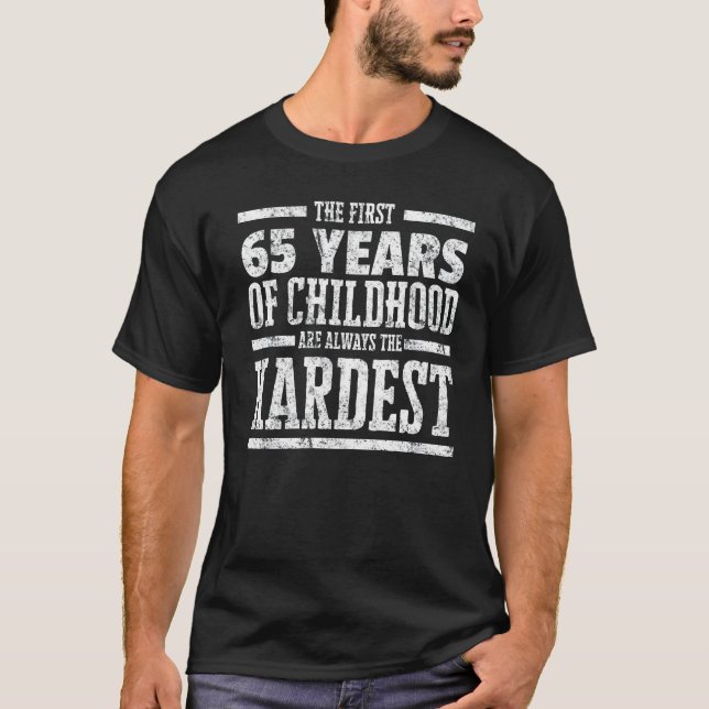 Camiseta Primeros 65 años de niñez siempre el Shi más duro (Anverso)