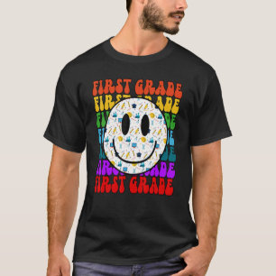 Camiseta Profesor de primer grado feliz de la cara feliz es