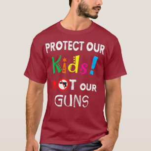 Camiseta Protege a nuestros niños, no a nuestras armas, tu 