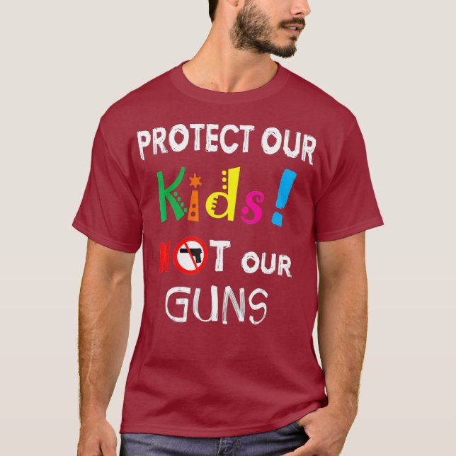 Camiseta Protege a nuestros niños, no a nuestras armas, tu  (Anverso)
