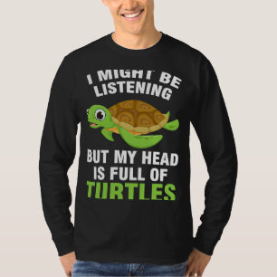 Camiseta Puede que esté escuchando pero mi cabeza está llen