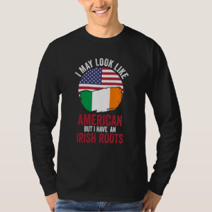 Camiseta Puedo parecer estadounidense pero tengo raíces irl