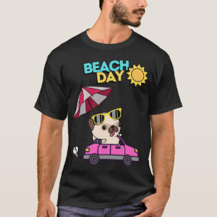 Camiseta Pug adorable conduciendo un convertible con paragu