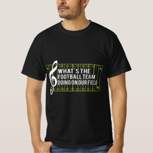 Camiseta ¿Qué está haciendo el equipo de fútbol en nuestro 