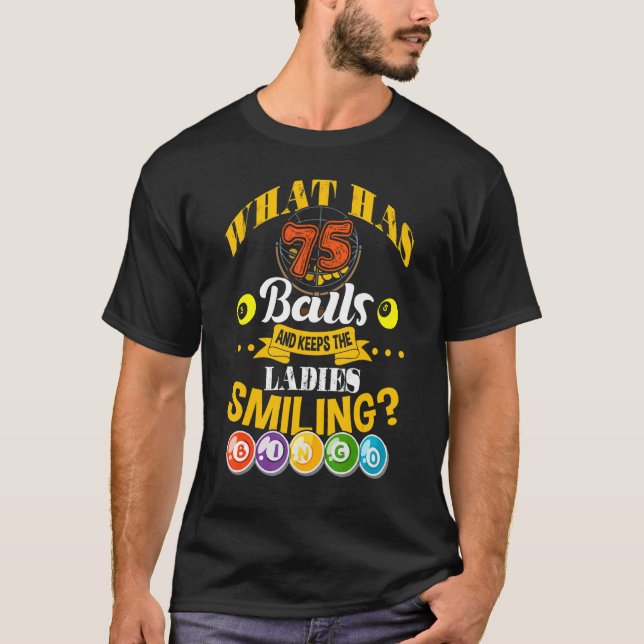 Camiseta ¿Qué Tiene 75 Bolas Y Mantiene A Las Damas Sonrien (Anverso)