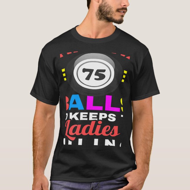 Camiseta ¿Qué Tiene 75 Bolas Y Mantiene A Las Damas Sonrien (Anverso)