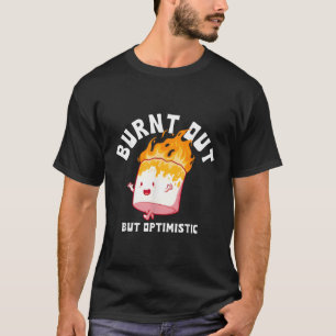 Camiseta Quemados, pero optimistas diciendo una cita de hum
