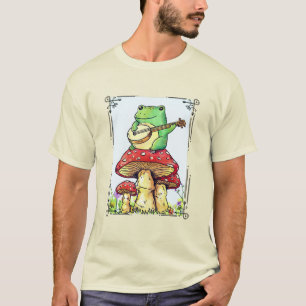 Camiseta Rana Cottagecore con casa de hongos tocando banjo