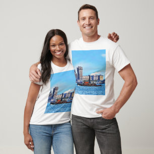 Camiseta Remolcadores cerca del horizonte de la ciudad de N