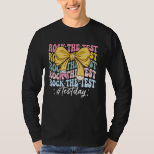 Camiseta Rock The Test Testing Day Coquette Bow Motivationa