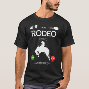 Camiseta Rodeo Está Llamando Y Debo Ir A Caballo En Oeste