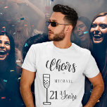 Camiseta Saludos a cualquier hombre de edad años cumpleaños<br><div class="desc">Saludos a la camiseta de cumpleaños de 21 años con un guión moderno de tipografía escrita a mano y una flauta de champán.            fácil de personalizar con el nombre y la edad.</div>