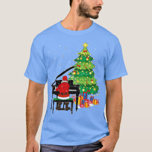 Camiseta Santa Claus juega al piano cerca del árbol de Navi