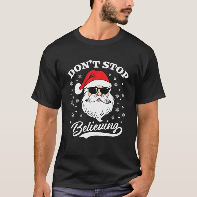 Camiseta Santa Claus no deja de creer a Navidades graciosos (Anverso)