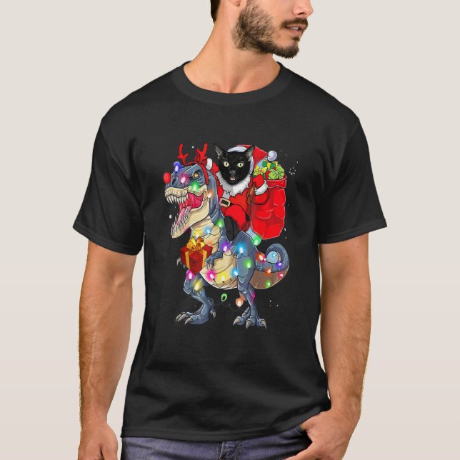 Camiseta Santa de gato negro montando Dinosaurio rex Navida (Anverso)