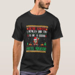Camiseta Santa intenta ser una graciosa Christm consejera d<br><div class="desc">Santa Intenta ser un Asesor de piezas buenas Navidades divertidos</div>