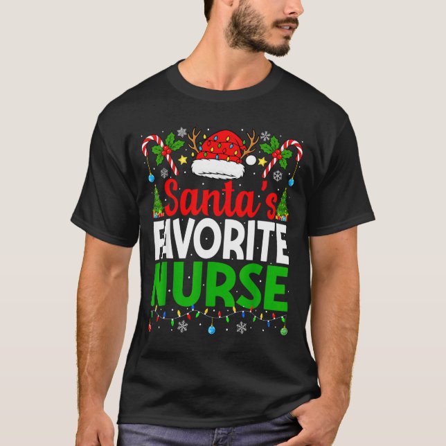 Camiseta Santas Favorite Nurse Rn Christmas Nursing Christm (Anverso)