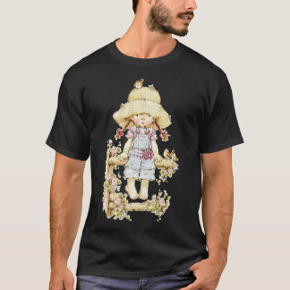 Camiseta Sarah Kay - Chica sentada en una valla con pájaros