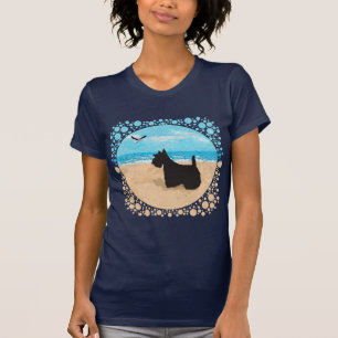 Camiseta Scottie en la playa con gaviota