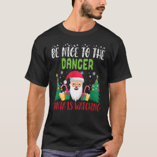 Camiseta Sé agradable con el DANCER Santa está viendo Navid