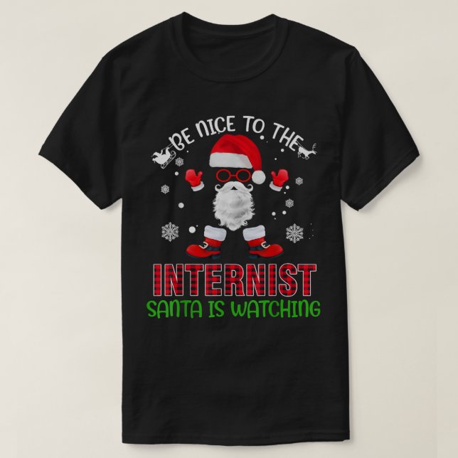 Camiseta Sé Agradable Con El Internista Santa Está Viendo G (Diseño del anverso)