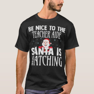 Camiseta Sé Agradable Con El Profesor Aide Santa Está Viend