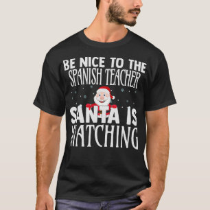 Camiseta Sé Agradable Con El Profesor Español Santa Está Vi
