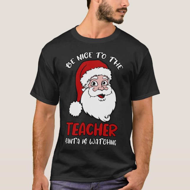 Camiseta Sé Agradable Con El Profesor Que Santa Está Viendo (Anverso)