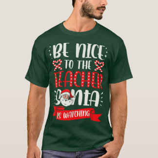 Camiseta Sé Agradable Con El Profesor Santa Está Viendo A C