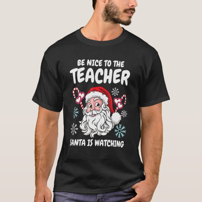 Camiseta Sé Agradable Con El Profesor Santa Está Viendo Nav (Anverso)