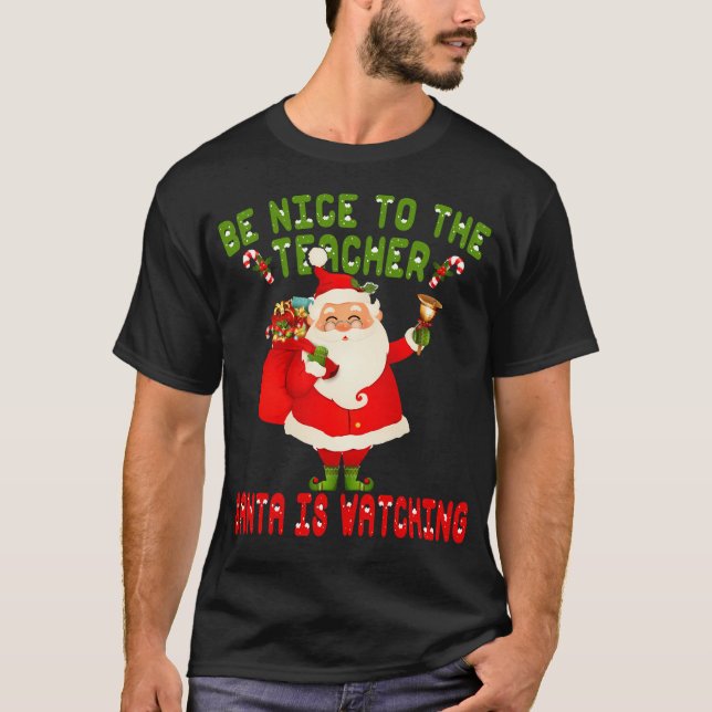 Camiseta Sé Agradable Con El Profesor Santa Está Viendo Shi (Anverso)