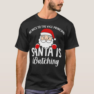 Camiseta Sé Agradable Con El Vice Director Santa Está Viend