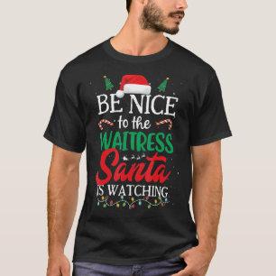 Camiseta Sé agradable con la camarera que Santa está viendo