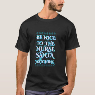 Camiseta Sé Agradable Con La Enfermera Santa Que Está Viend