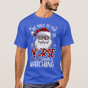 Camiseta Sé Agradable Con La Enfermera Santa Que Está Viend