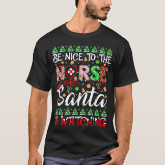 Camiseta Sé Agradable Con La Enfermera Santa Que Está Viend