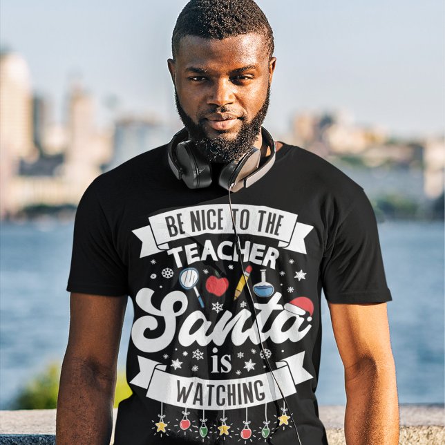 Camiseta Sé amable con el profesor Santa está viendo Navida (Subido por el creador)