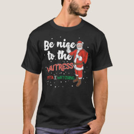 Camiseta sé amable con la mesera que santa está mirando