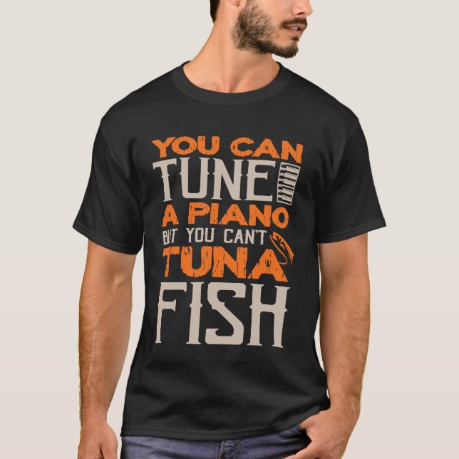 Camiseta Se Puede Tintar Un Piano Pero No Se Puede Pescar E (Anverso)