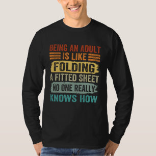 Camiseta Ser adulto es como doblar una sábana ajustable  2
