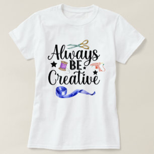Camiseta Ser siempre creativa con letras negras para las mu