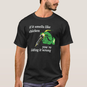 Camiseta Si huele a pollo, lo estás sosteniendo mal