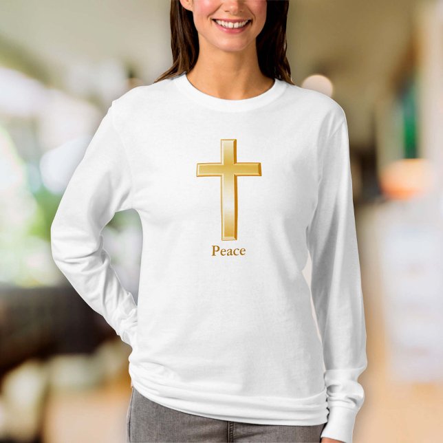 Camiseta Símbolo de oro de la Cruz Cristiana (The gold cross is a religious symbol of the Christian faith. )
