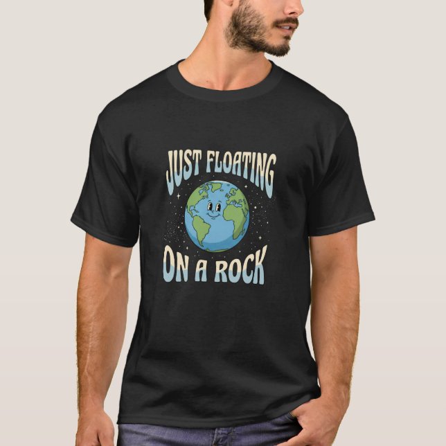 Camiseta Simplemente flotando en una roca Humor cósmico Spa (Anverso)