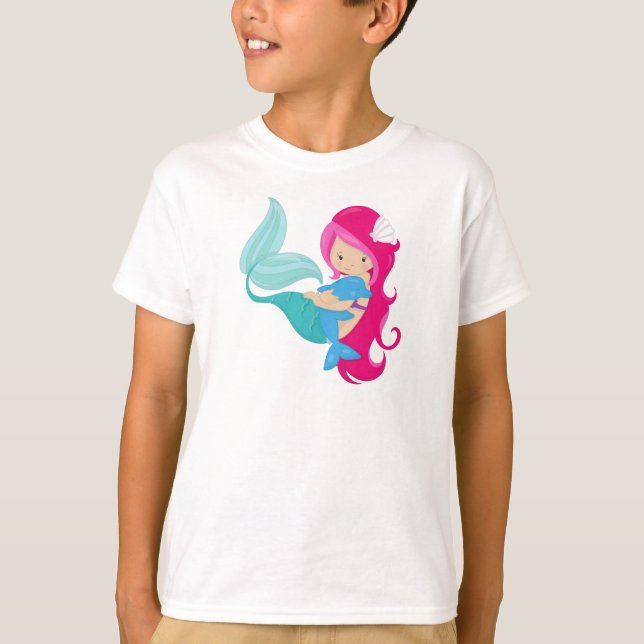 Camiseta Sirena Cuidada, Sirena Pequeña, Pelo Rosa, Delfín (Anverso)